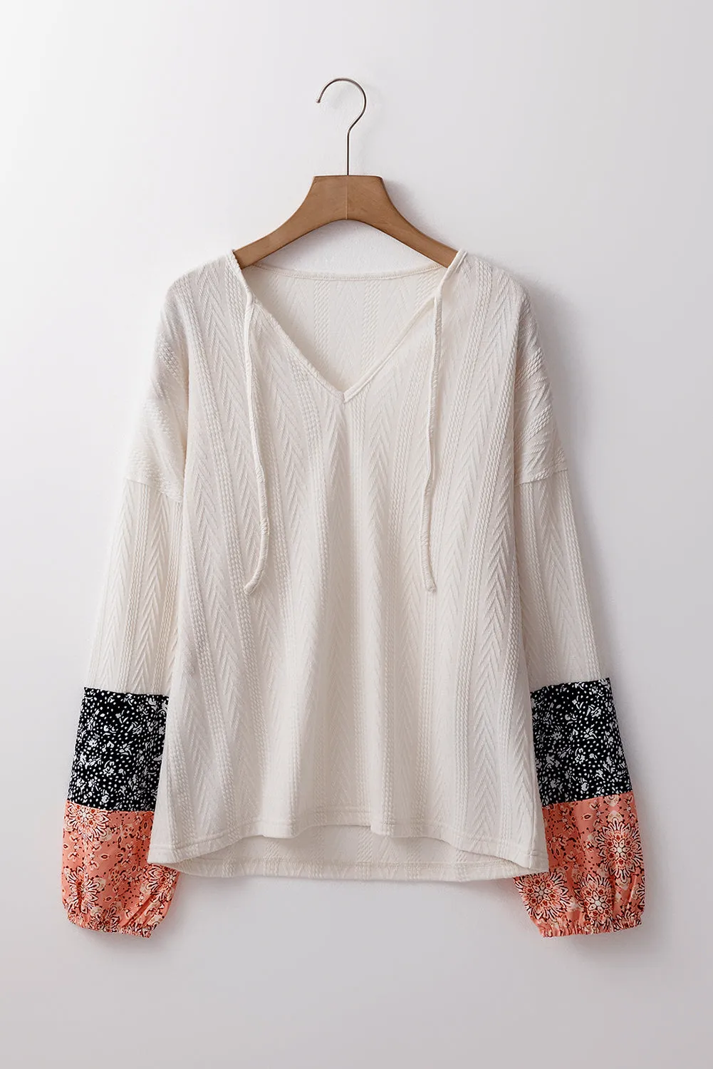 KaleaBoutique Floral Patchwork Textured Knit Drawstring V Neck Blouse