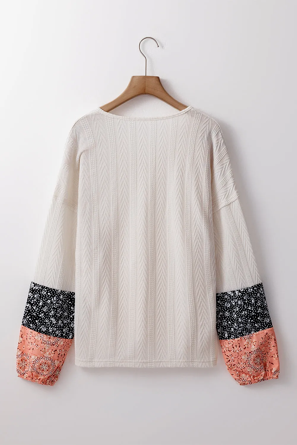 KaleaBoutique Floral Patchwork Textured Knit Drawstring V Neck Blouse