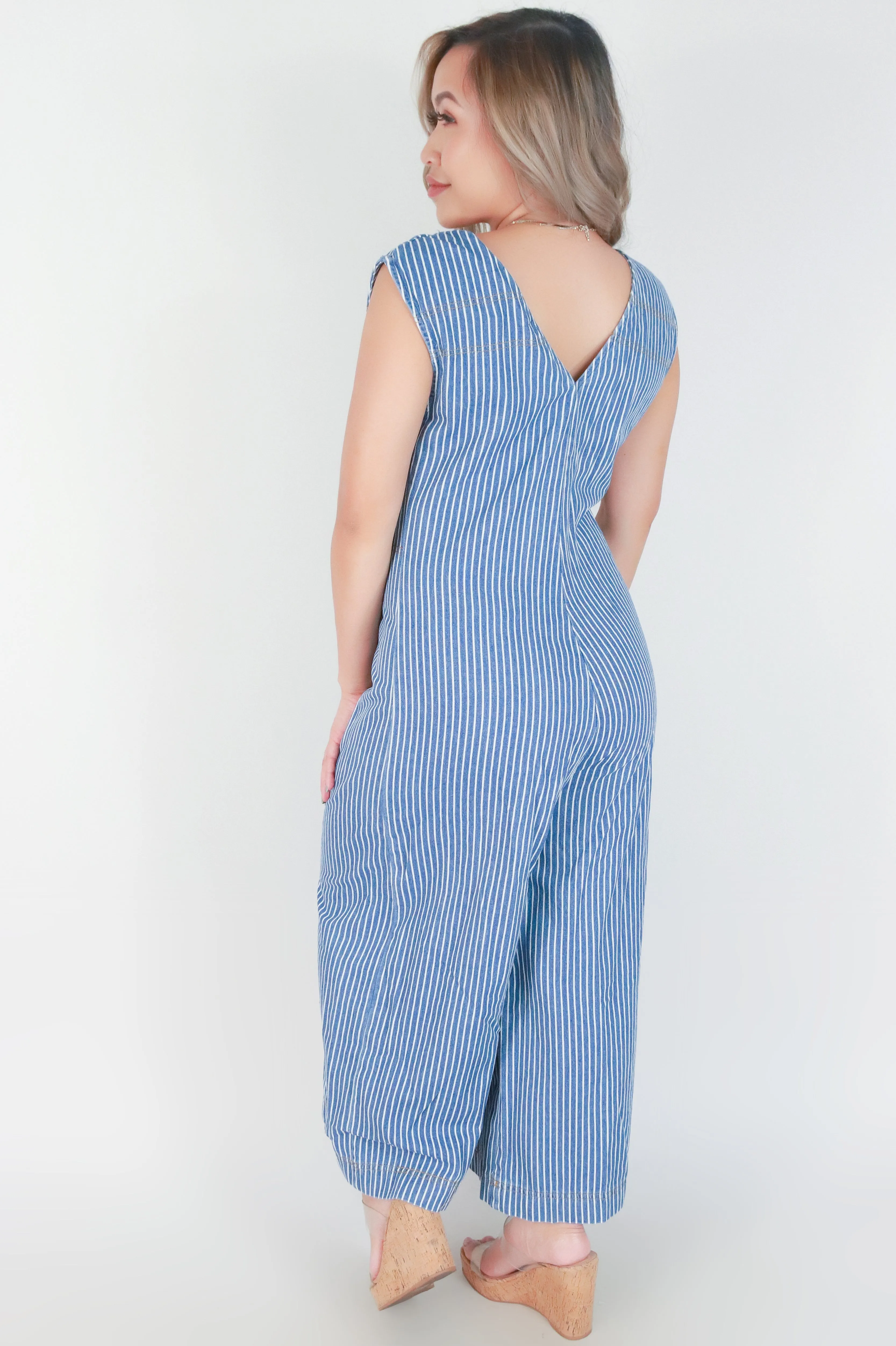 SLEEVELESS BUTTON DOWN JUMPSUIT