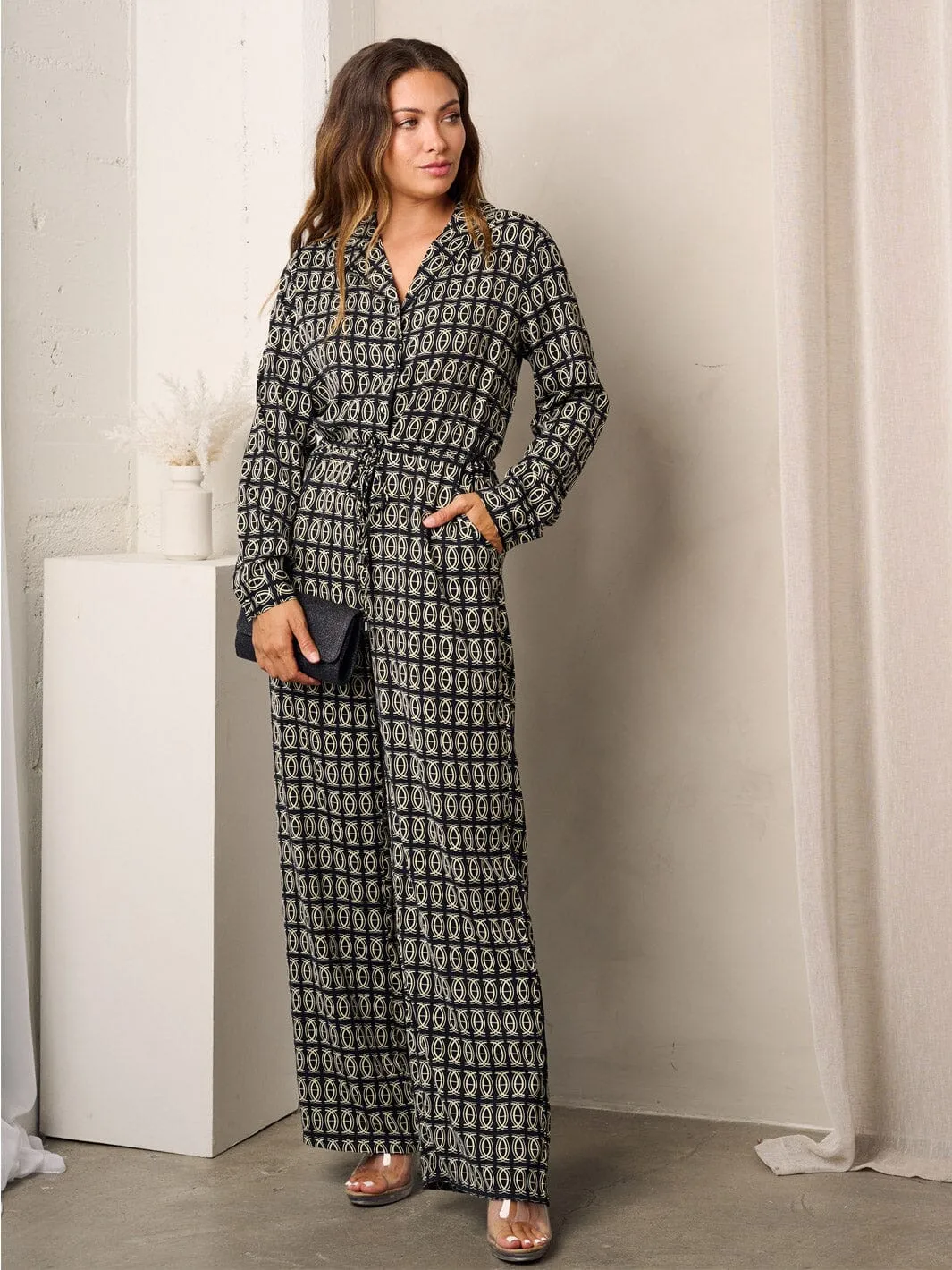 WOMEN'S LONG SLEEVE BUTTON UP MULTI PRINT JUMPSUIT