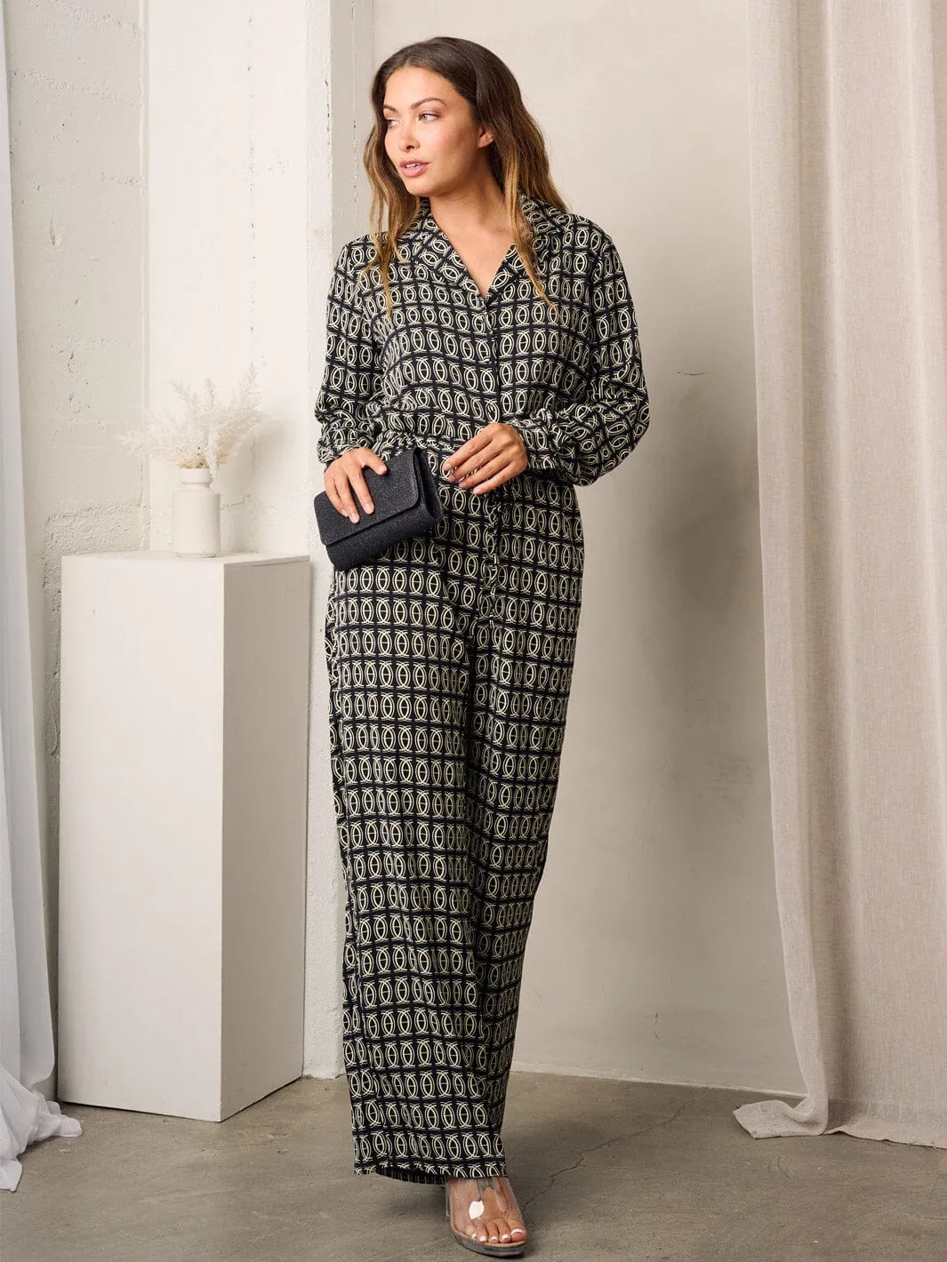 WOMEN'S LONG SLEEVE BUTTON UP MULTI PRINT JUMPSUIT
